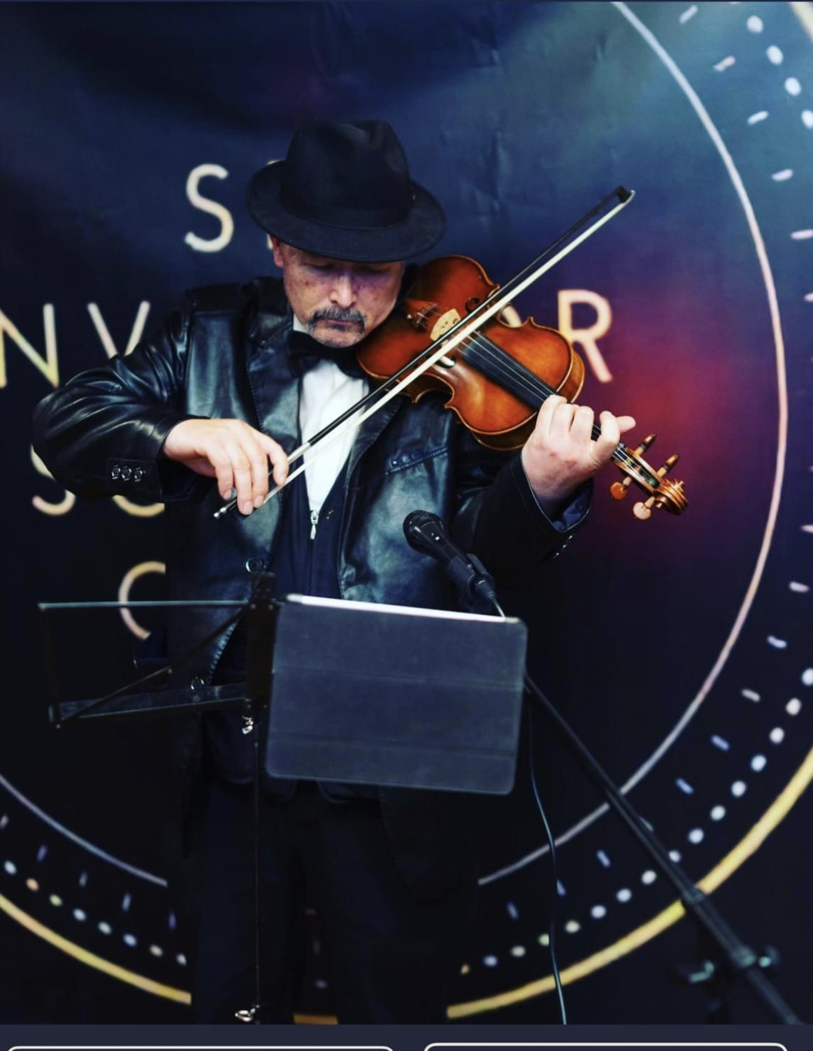 The Strolling Violinist photo